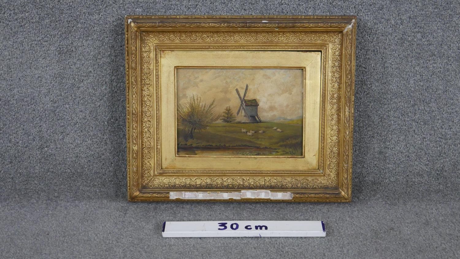 A carved gilt framed 19th century oil on canvas of a landscape with windmill and pond. Signed W. - Image 6 of 6