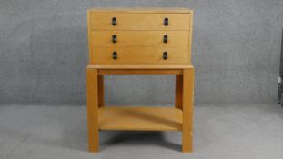 A mid century vintage Remploy teak chest on stand. H104 W.70 D.39cm