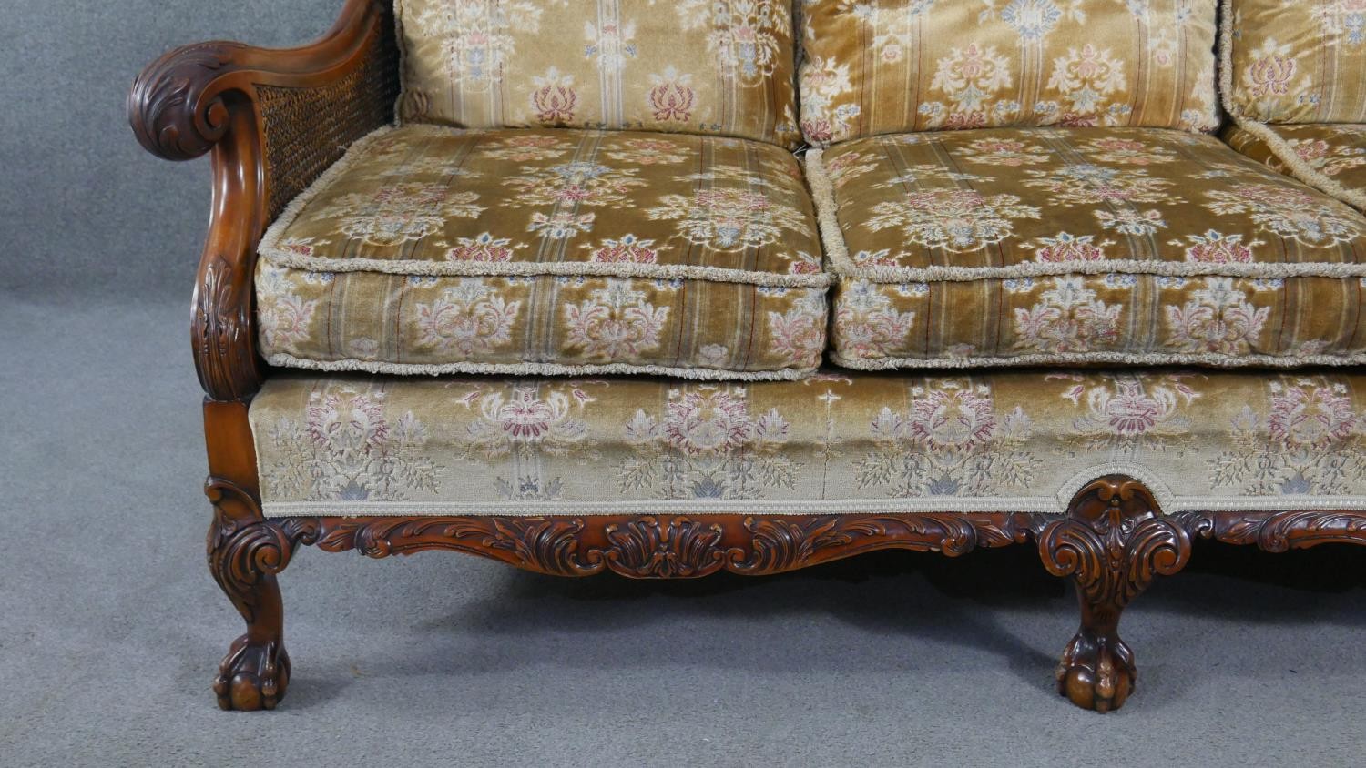 A mid century carved walnut three seater bergere sofa with double caned sides in cut floral - Image 3 of 7