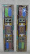 Two early 20th century rectangular leaded stained glass panels with coloured bosses and floral