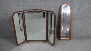 An early 20th century mahogany framed triple section bevelled plate dressing table mirror along with