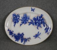 A large 19th century Doulton Burslem ceramic oval serving platter with blue and white Oriental