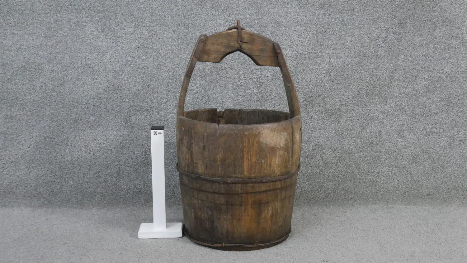 A metal bound well bucket. H.55 Diam.33cm - Image 4 of 4