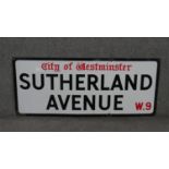 A vintage enamelled iron street sign for Sutherland Avenue, City of Westminster, with iconic and