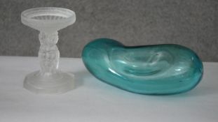 A turquoise blown art glass pebble along with a frosted glass tazza with cherub design stem. H.10