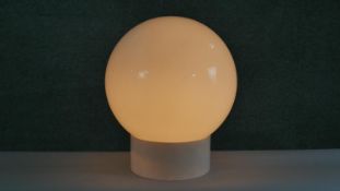 A large mid century white acrylic table lamp with opaque white glass globe shade. H.45 W.40cm