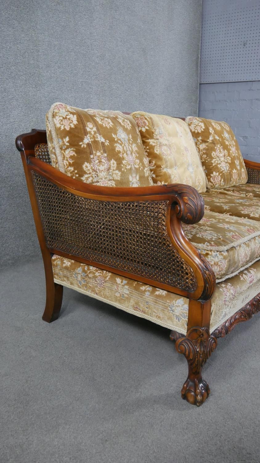 A mid century carved walnut three seater bergere sofa with double caned sides in cut floral - Image 2 of 7