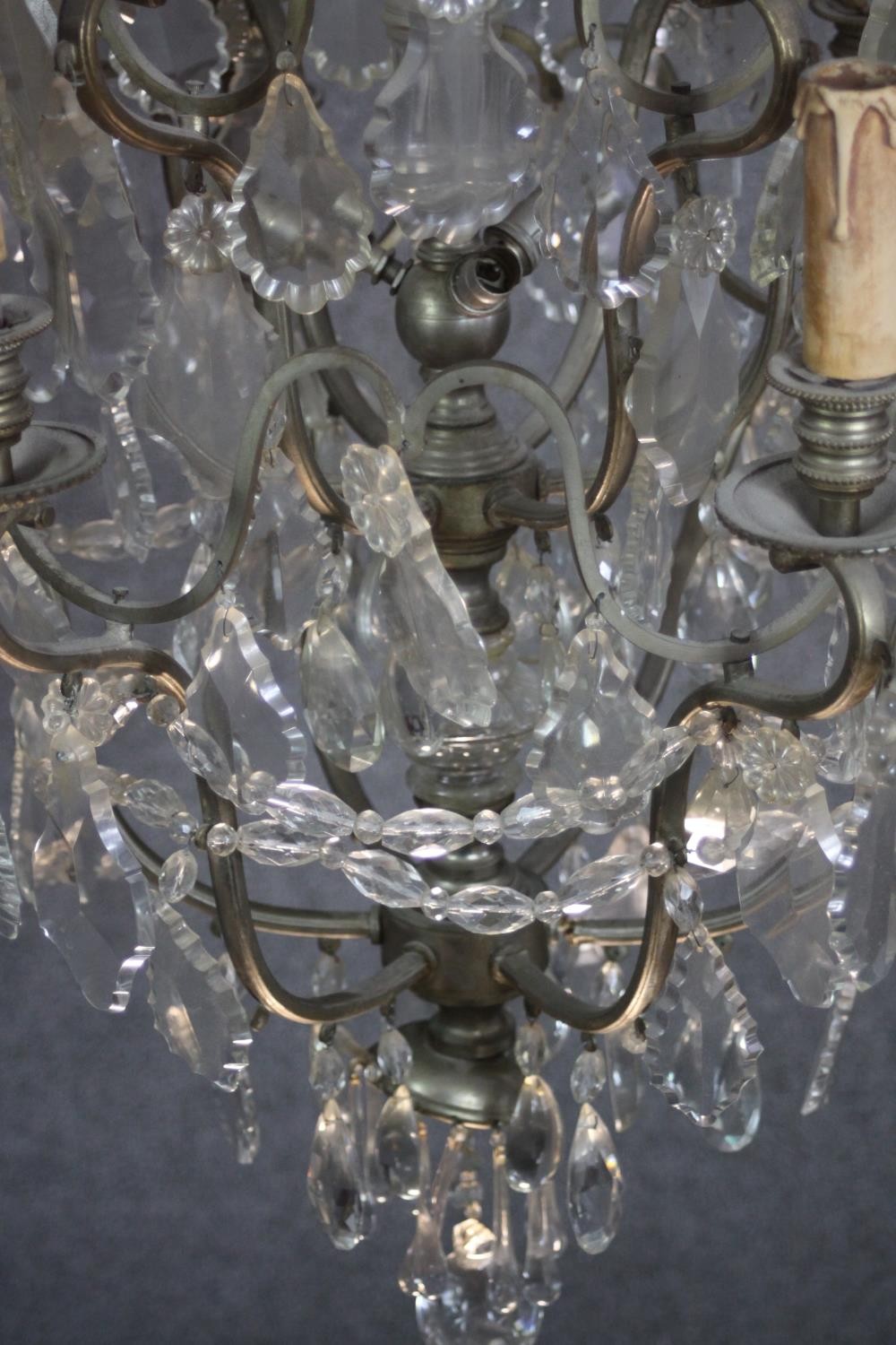 A vintage cut crystal and brass twelve branch chandelier with crystal swags and faceted ball to - Image 2 of 5