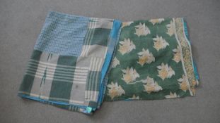 Two cotton repeating design padded blankets. L.210 W.140 cm (largest)
