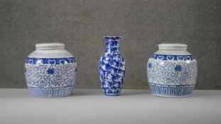 A collection of blue and white hand painted porcelain. A pair of Chinese blue and white lidded