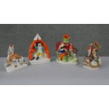 A collection of 19th century Staffordshire pottery figures. Including three spill vases, one with
