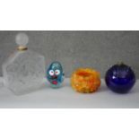 A collection of glass. Including a large frosted glass display perfume bottle with stopper, a