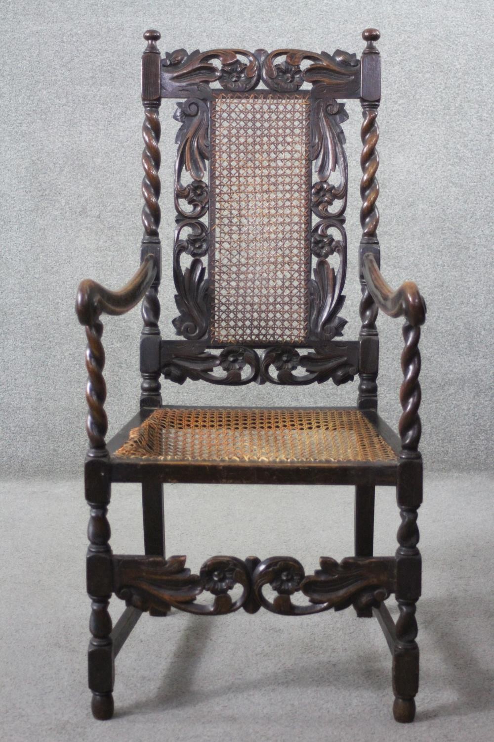 A late 19th century carved oak armchair with caned back and seat on stretchered barleytwist - Image 2 of 7