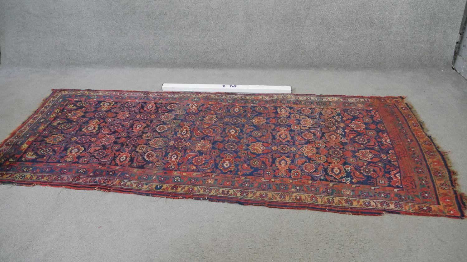 A Persian Mahal carpet with allover floral decoration on a midnight blue ground contained within - Image 2 of 5