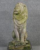 A 19th century carved stone seated lion. H.82 W.37 D.37cm