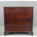 A Georgian mahogany chest of drawers on shaped bracket feet. H.99 W.110 D.52cm