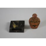 A 20th century Chinese carved resin snuff bottle with horse design along with a Japanese Damascene