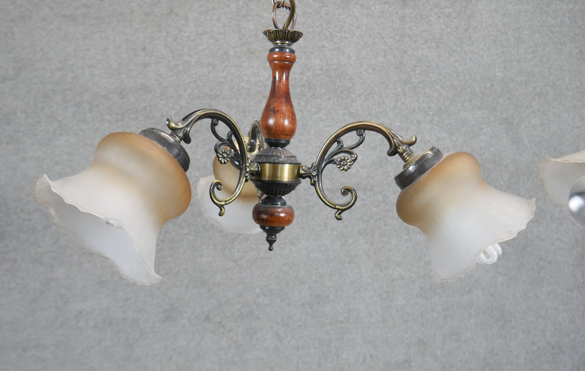 A pair of brass and wood effect three branch chandeliers with opaque fluted glass shades. Diam.50cm - Image 2 of 5