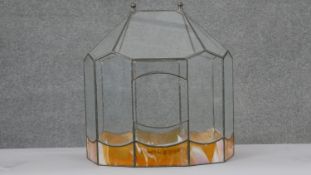 A vintage lead and stained glass terrarium. H.42 W.39 D.26cm