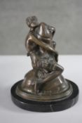 B. Zach - A bronze figure group titled 'THE HUGGER', having a scantily clad female embracing a