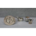 A collection of silver plate. Including an Elkington & Co repousse neoclassical design circular