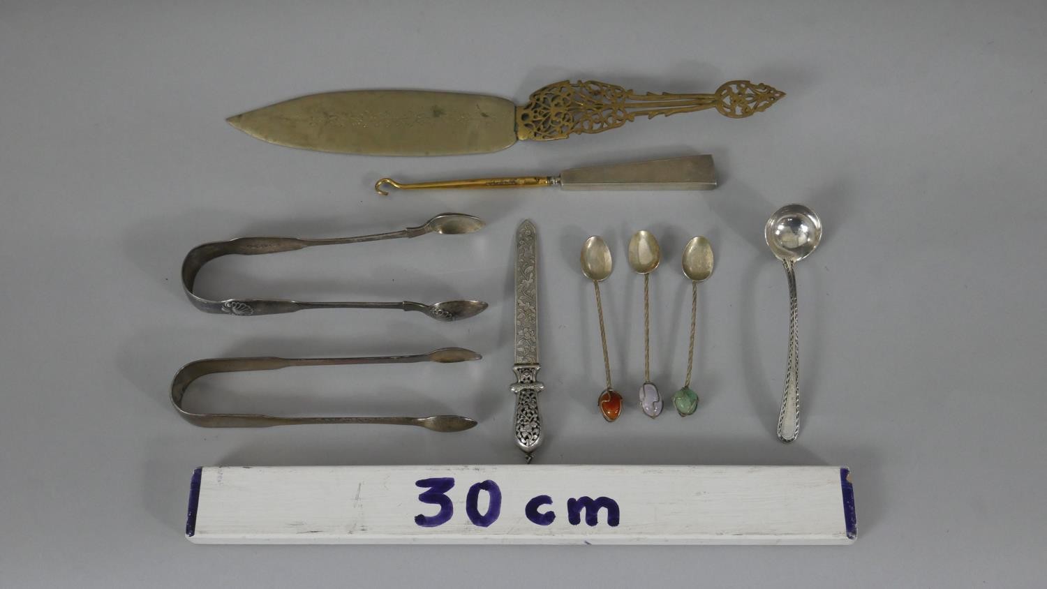 A collection of silver and silver plate. Including two sets of silver sugar tongs, one with shell - Image 2 of 10