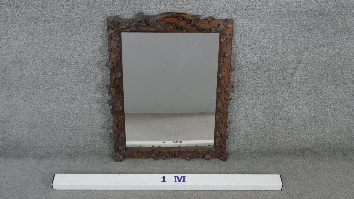 A late 19th century oak wall mirror with finely carved Art Nouveau floral spray of bluebells. ivy - Image 4 of 4
