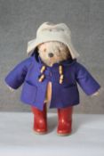 A Vintage Gabrielle Designs Paddington Bear with original label and red Dunlop wellington boots. H.