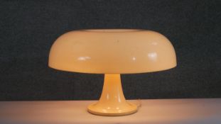 A mid 20th Century studio Artemide Milano 'Nesso' cream acrylic mushroom shaped table lamp.