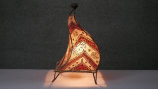 A vintage Moroccan leather and henna design pyramidal table lamp. H.45 W.26cm