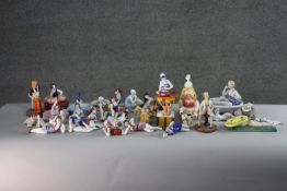 A collection of approximately thirty five erotic ceramic and resin figures. Many of bathers in the