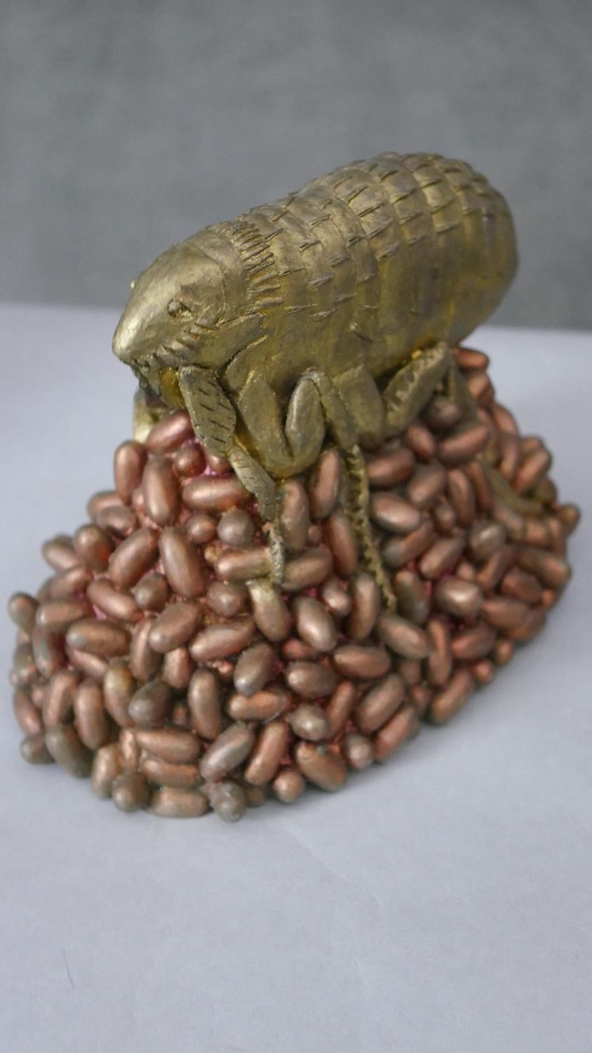 A gilded resin model of a flea on a pile of eggs along with a silvered covered model of a blue tit - Image 5 of 8