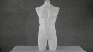 A frosted fibreglass male torso shop mannequin. H.95 W.44cm