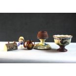 A collection of ceramics. Including two piece of Torquay ware, a Royal Doulton Kingsware Dickens