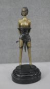 An Art Deco style patinated brass figure of 'The Whip Girl' after Bruno Zach. H.32 W.14 D.11cm