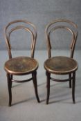 A pair of vintage bentwood Fischel cafe chairs.