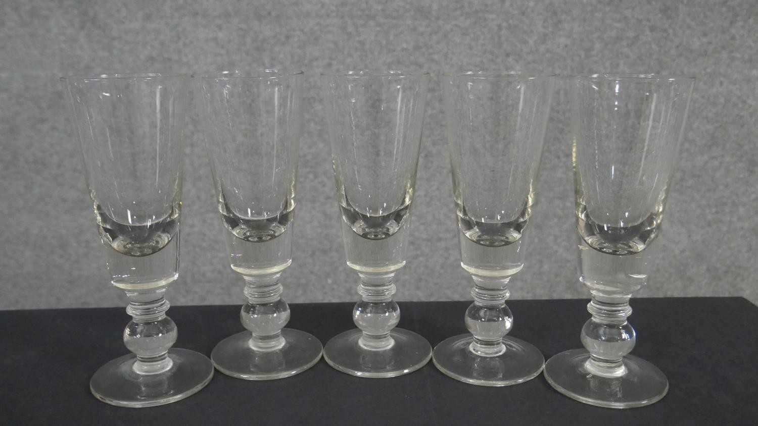 A collection of eleven glasses. Including a set of five ball stem design wine glasses, a set of - Image 2 of 5
