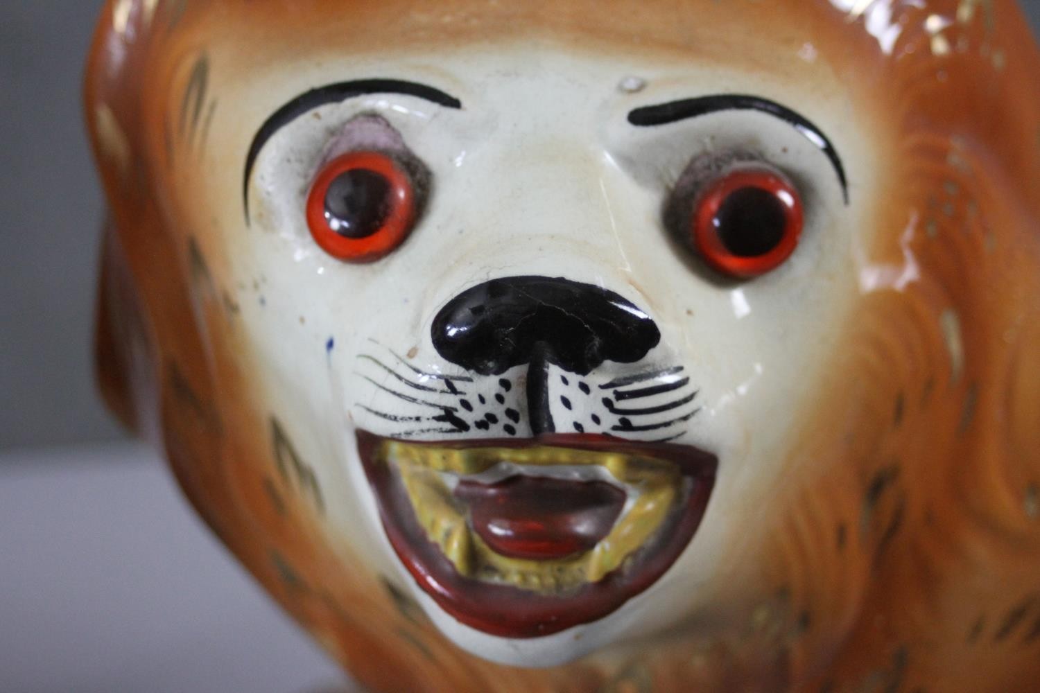 A pair of 19th century Staffordshire pottery lions with glass eyes along with a pair of - Image 4 of 8