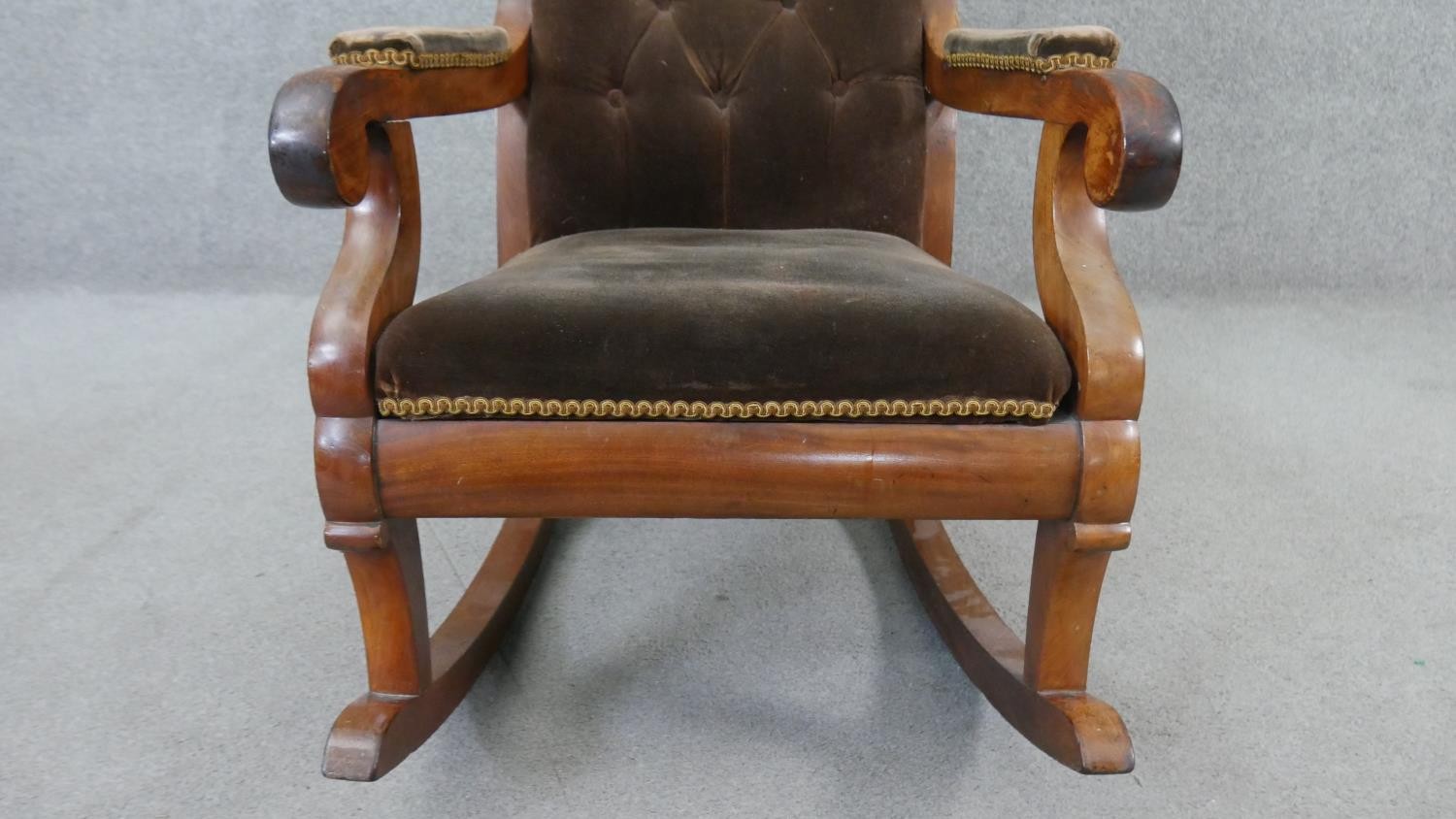 A 19th century mahogany framed rocking chair in buttoned velour upholstery. - Image 5 of 6