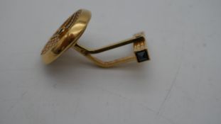A pair of 18 carat bi-colour gold rope design and sapphire cufflinks in box. Each cufflink set to