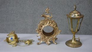 A brass coaching lantern along with a brass oil lamp fitting and gilt metal ormolu mantle clock