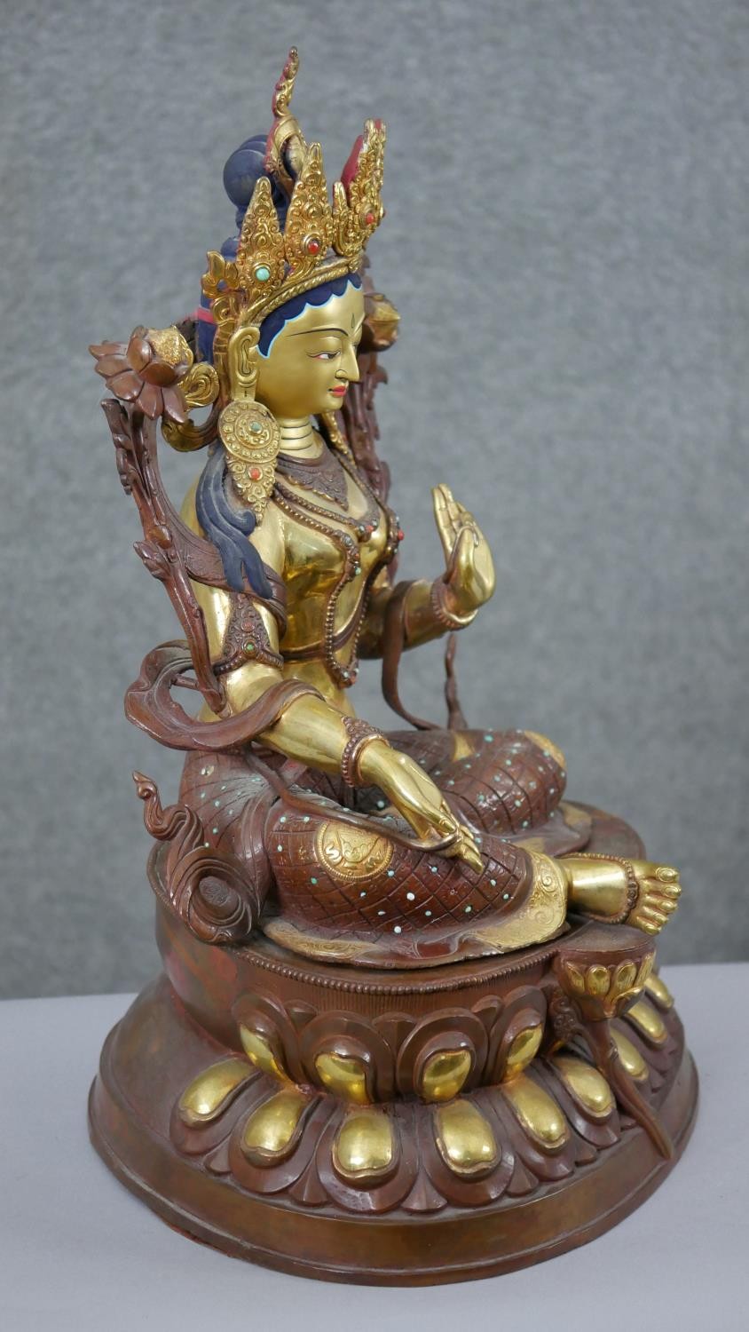 A large 20th century hand painted and gilded copper green Tara figure with hand painted details - Image 7 of 8