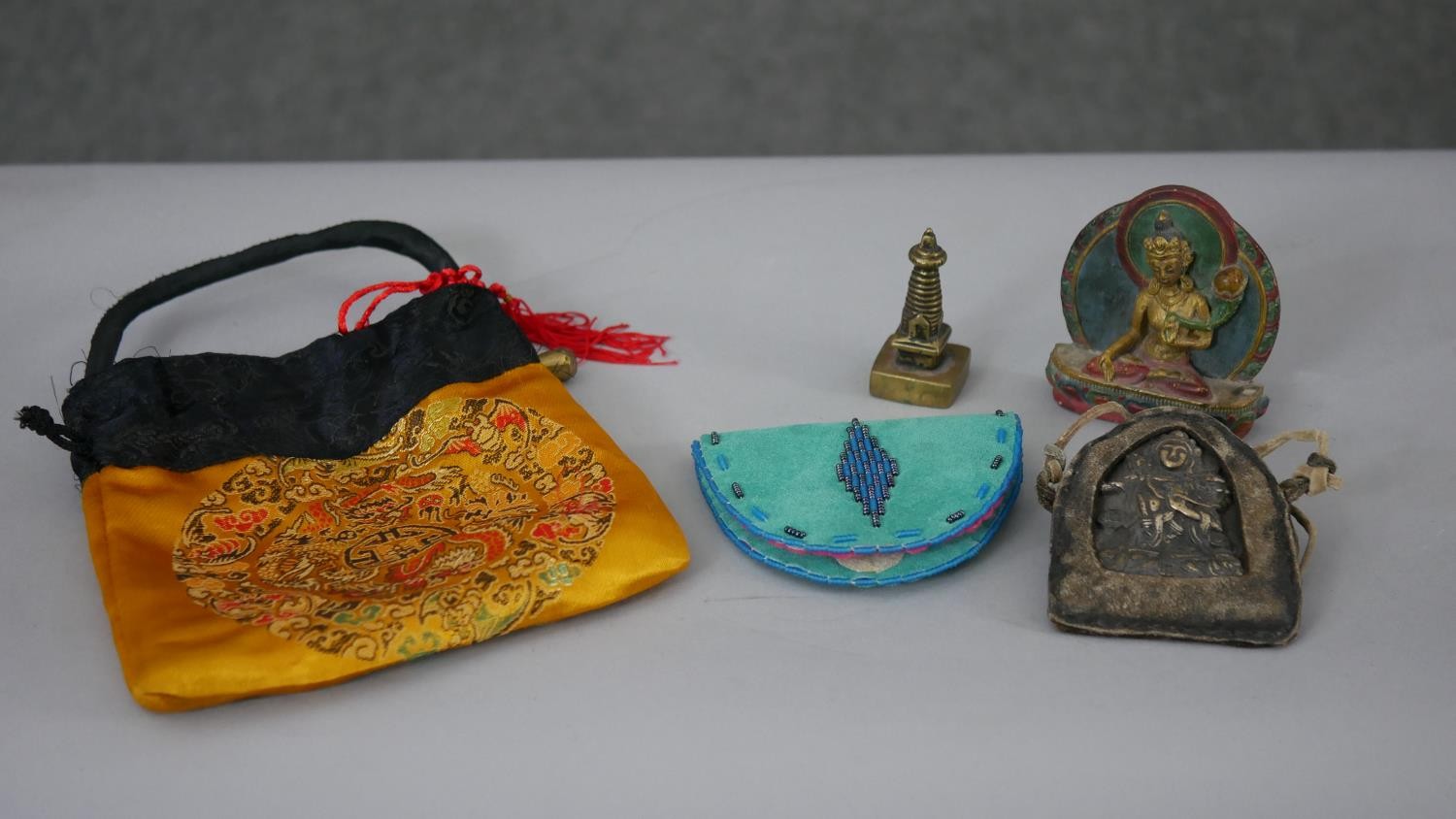 A collection of Tibetan silk bags and Buddhist items along with Native American suede bags with - Image 6 of 6