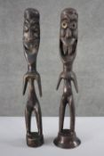 Two patinated spelter African tribal bronze figures. H.43 cm.
