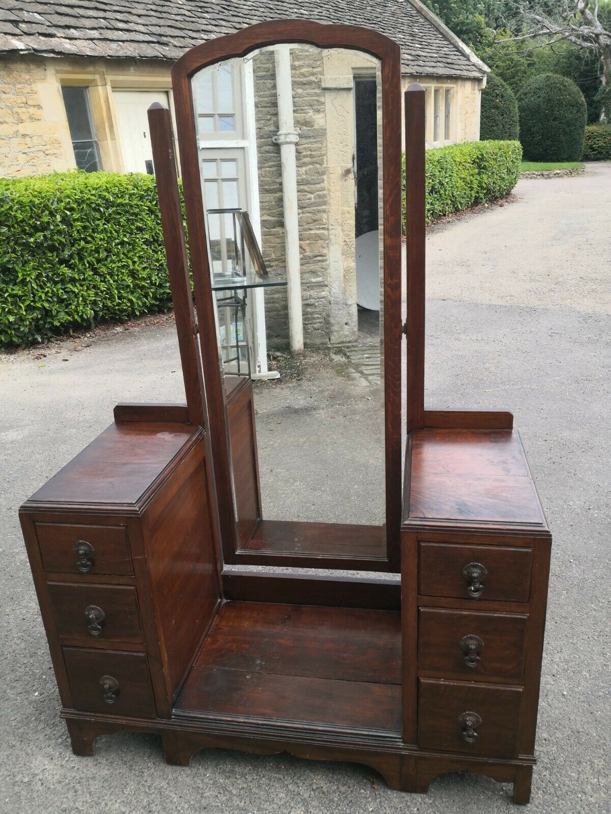 A mid century oak dressing table with central cheval style dressing mirror. H.162 W.110 D.48cm