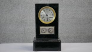 A 19th century French mantel clock with eight day movement, silvered dial and subsidiary day/date