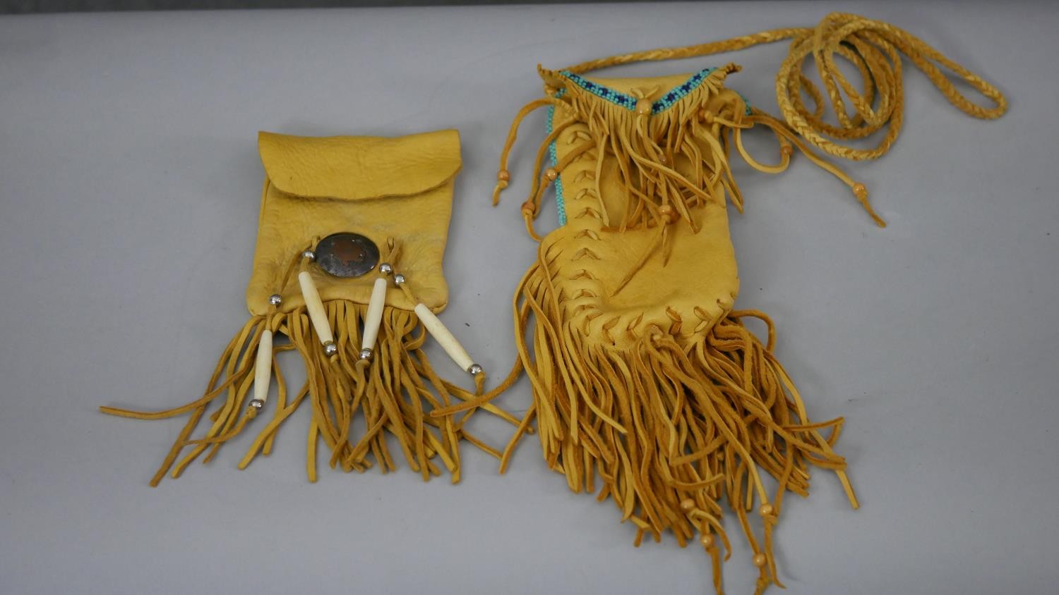 A collection of Tibetan silk bags and Buddhist items along with Native American suede bags with - Image 5 of 6