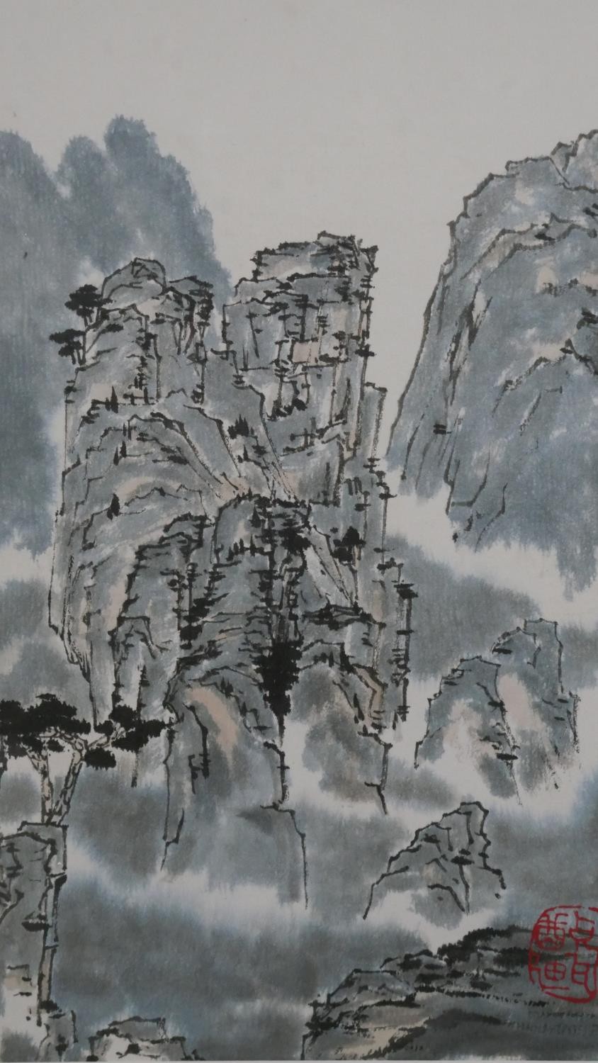 Peter Cavaciuti- A framed and glazed ink on paper of a Chinese mountain landscape, stamped with