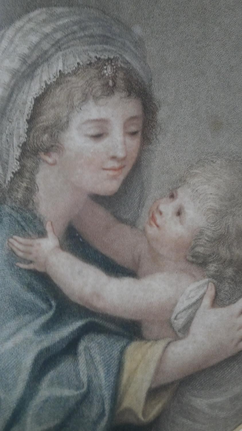 A framed and glazed 19th century hand coloured engraving of the Virgin Mary and Jesus. Unsigned. H.