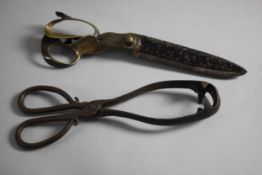 A pair of Wilkinson & Son 19th century tailor's scissors with brass grip and steel blades. Stamped